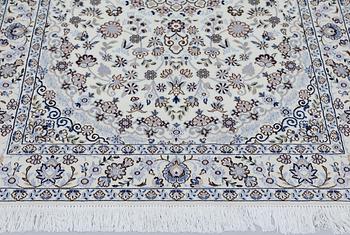 A Nain rug, part silk, so-called 9LAA, approx. 206 x 133 cm.