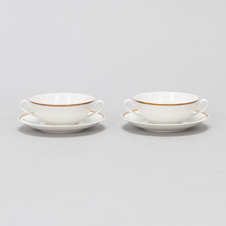 A Royal Copenhagen 'Tunna' porcelain broth bowl set for twelve, with saucers, Denmark 1957.