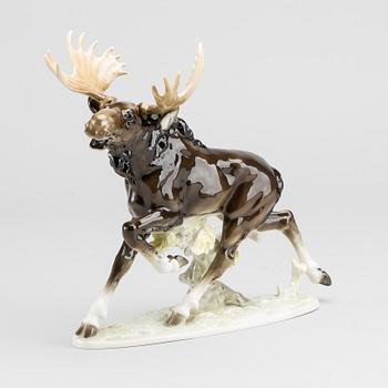 A PORCELAIN FIGURINE BY KARL TUTTER FOR HUTSCHENREUTER.