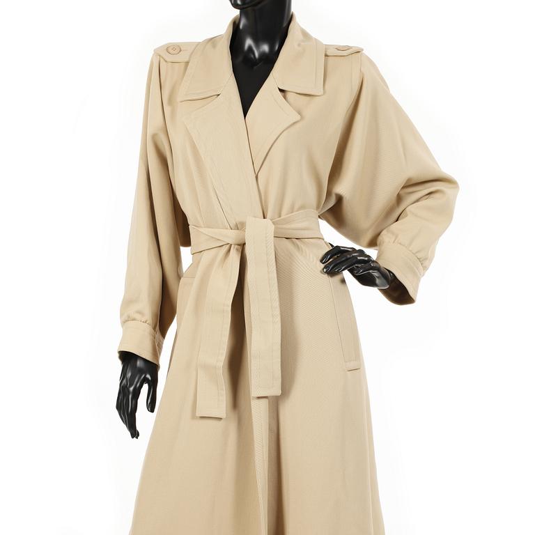 YVES SAINT LAURENT, a beige wool coat.