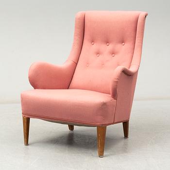 An 'Oscar' easy chair by Carl Malmsten.