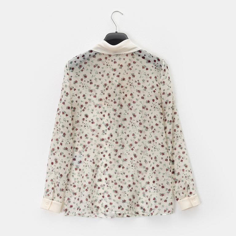 Yves Saint Laurent, a wool/silk blouse, size 36.
