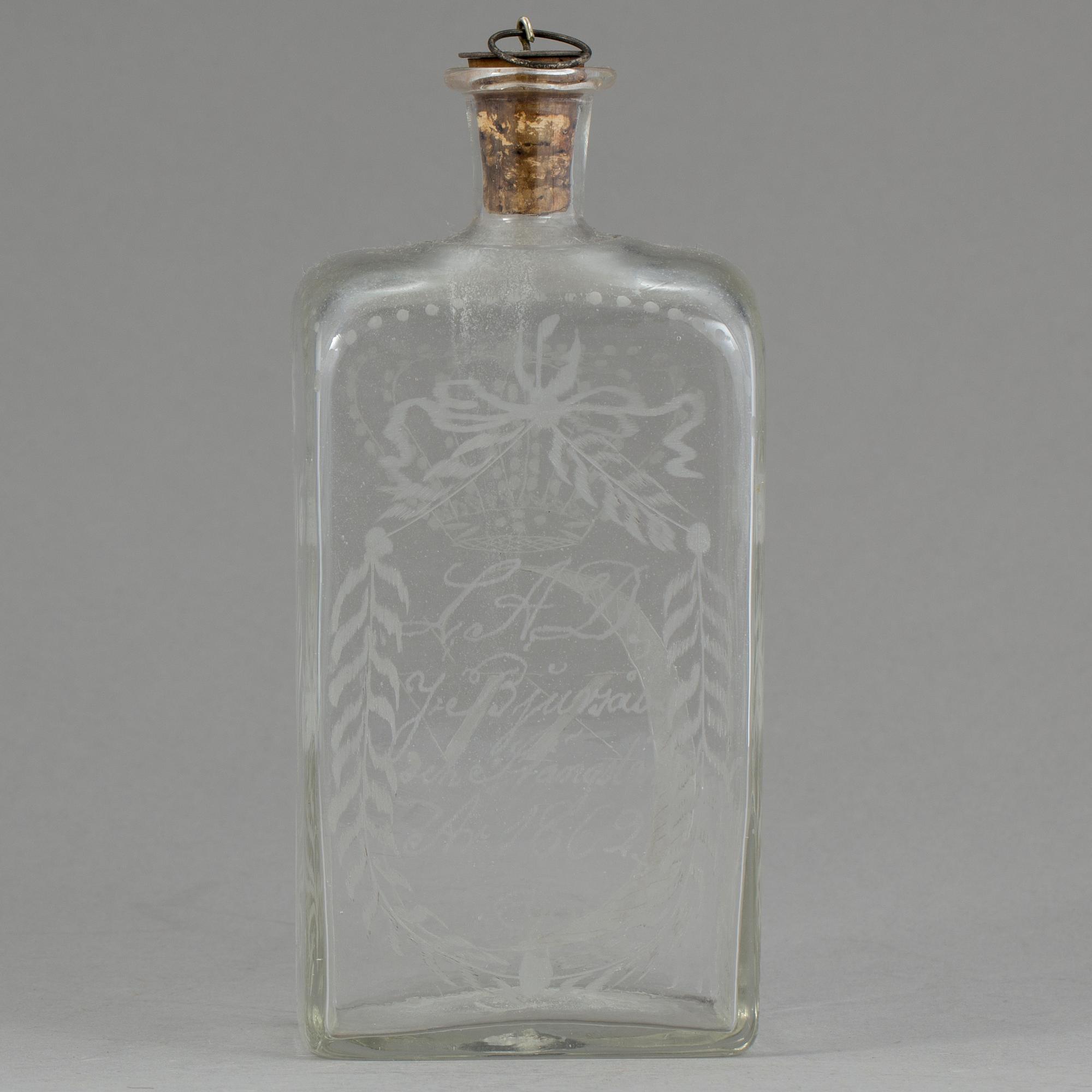BRÄNNVINSFLASKA, glas, Bjursås. Daterad 1862.