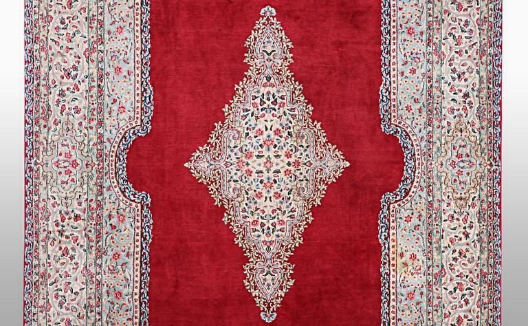 A carpet, Old Kerman, ca 357 x 265 cm.