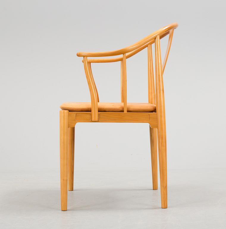 A Hans J Wegner 'Kinastolen' armchair, Fritz Hansen, Denmark 1971.