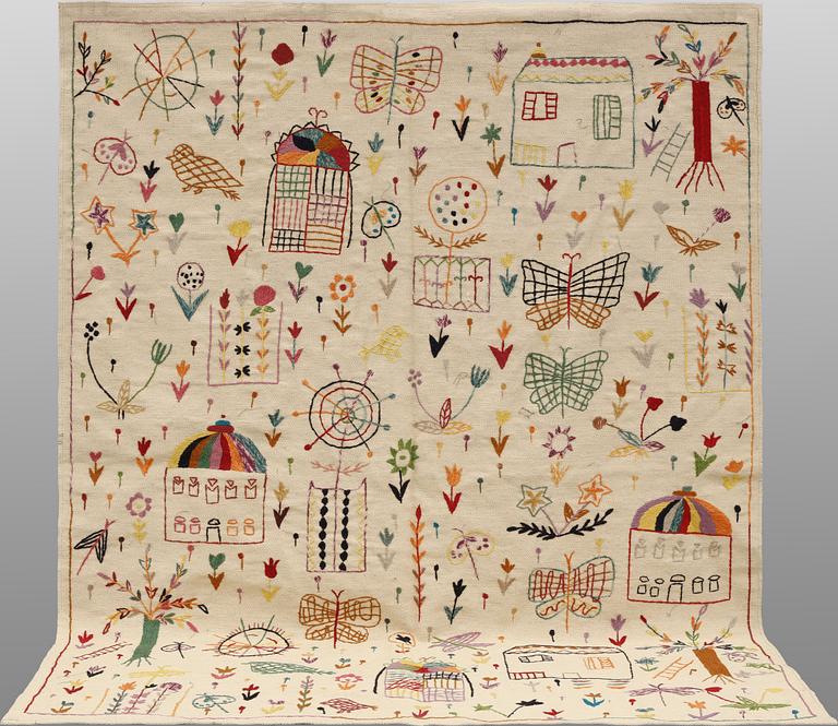 A hand-embroidered Kilim rug, approx. 240 x 181 cm.