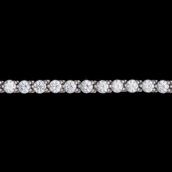 1156. A Cartier brilliant cut diamond line bracelet, tot. app. 4.80 cts.