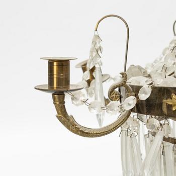 An Empire style chandelier, mid 20th Century.