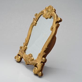 A TABLE MIRROR, Russia middle of the 19th century, gilt bronze.