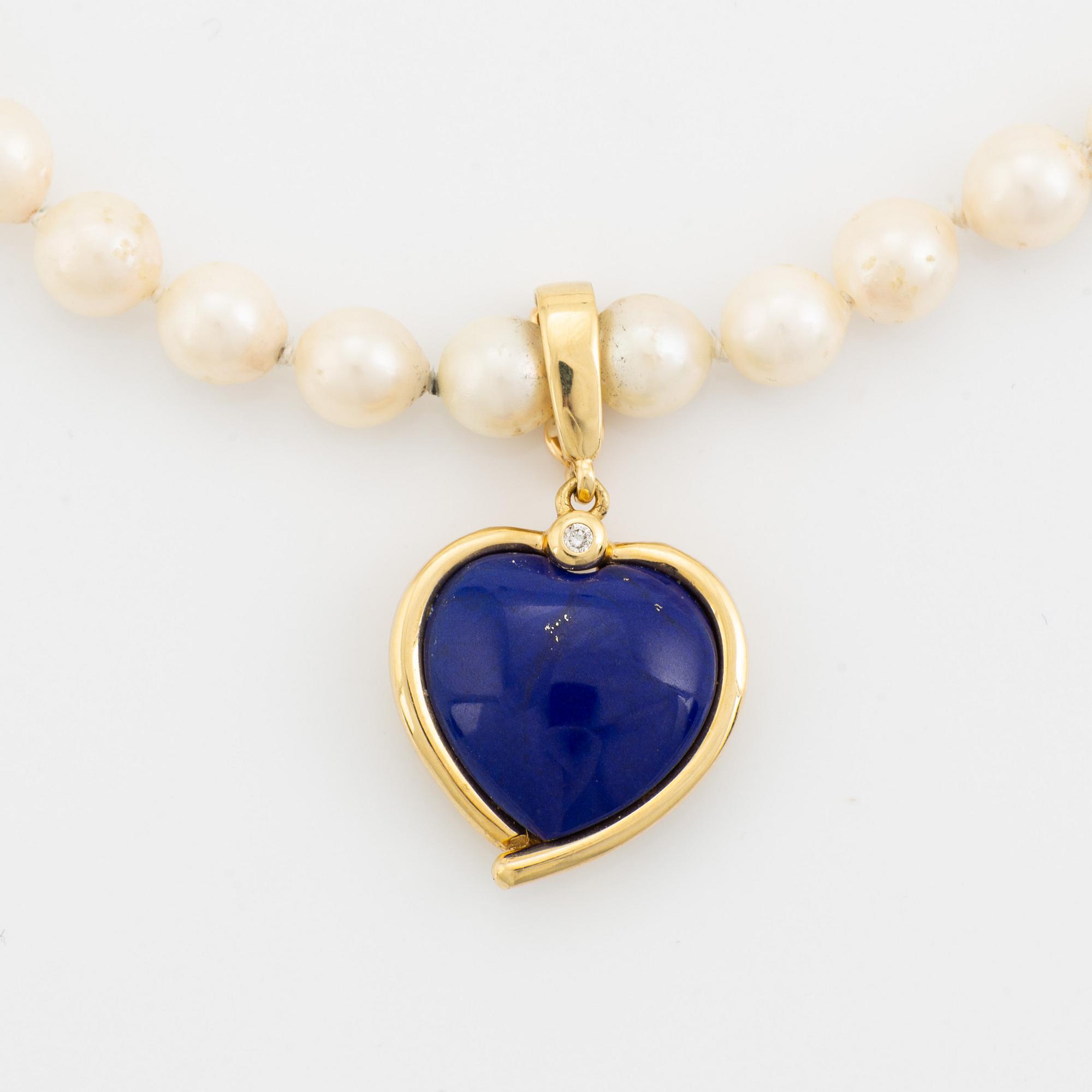 Cultured pearl necklace, with heart shaped charm.