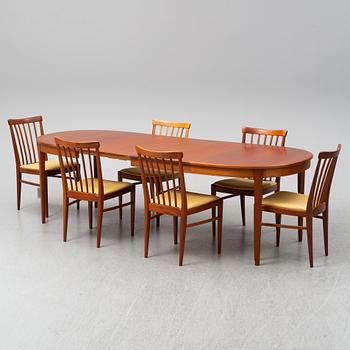 CARL MALMSTEN, A 'Herrgården' table with six chairs and two leaves.