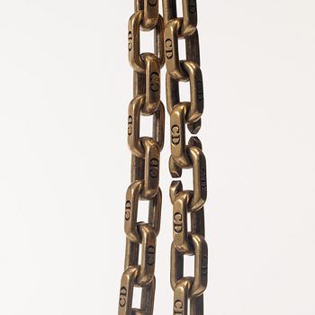 Christian Dior, A black leather "Dio(r)evolution" bag.