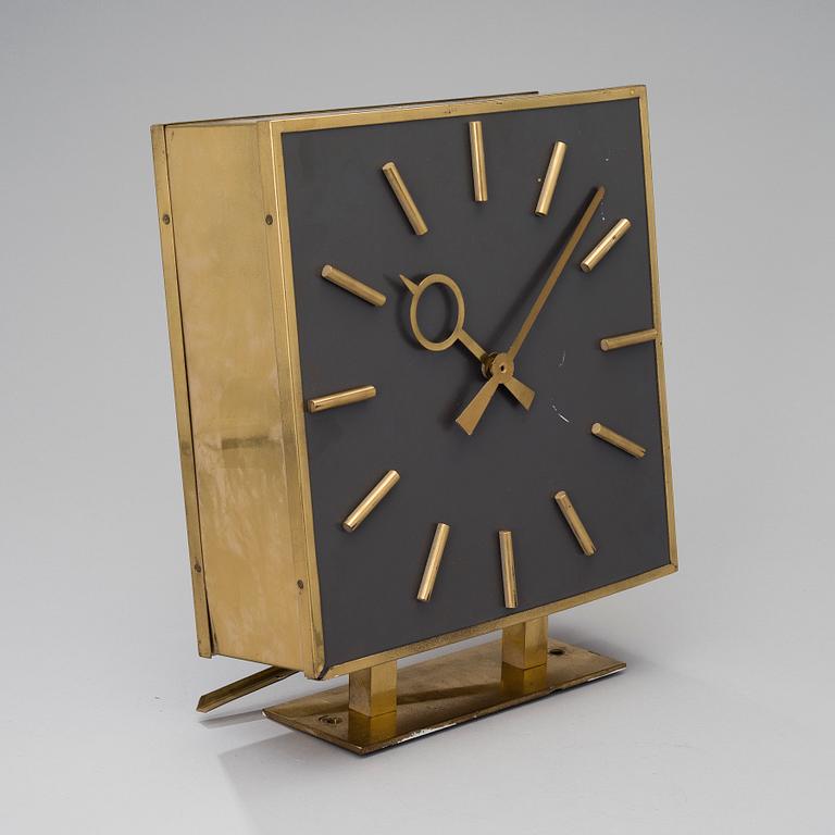 A TWO SIDED WALL CLOCK. From "Kuparitalo" (Copper House) in Helsinki. Late 1950s.