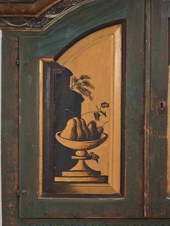 A polychrome-painted writing-cabinet attributed to J. Bäckström (1773-1837), dated 1828.