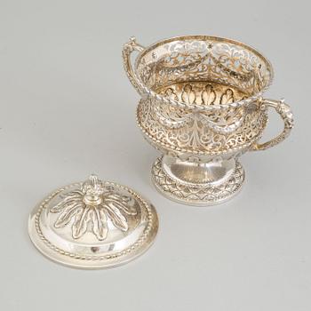 AN ENGLISH SILVER SWEETMEAT BOWL AND COVER, George Nathan & Ridley Hayes, Chester, 1908.