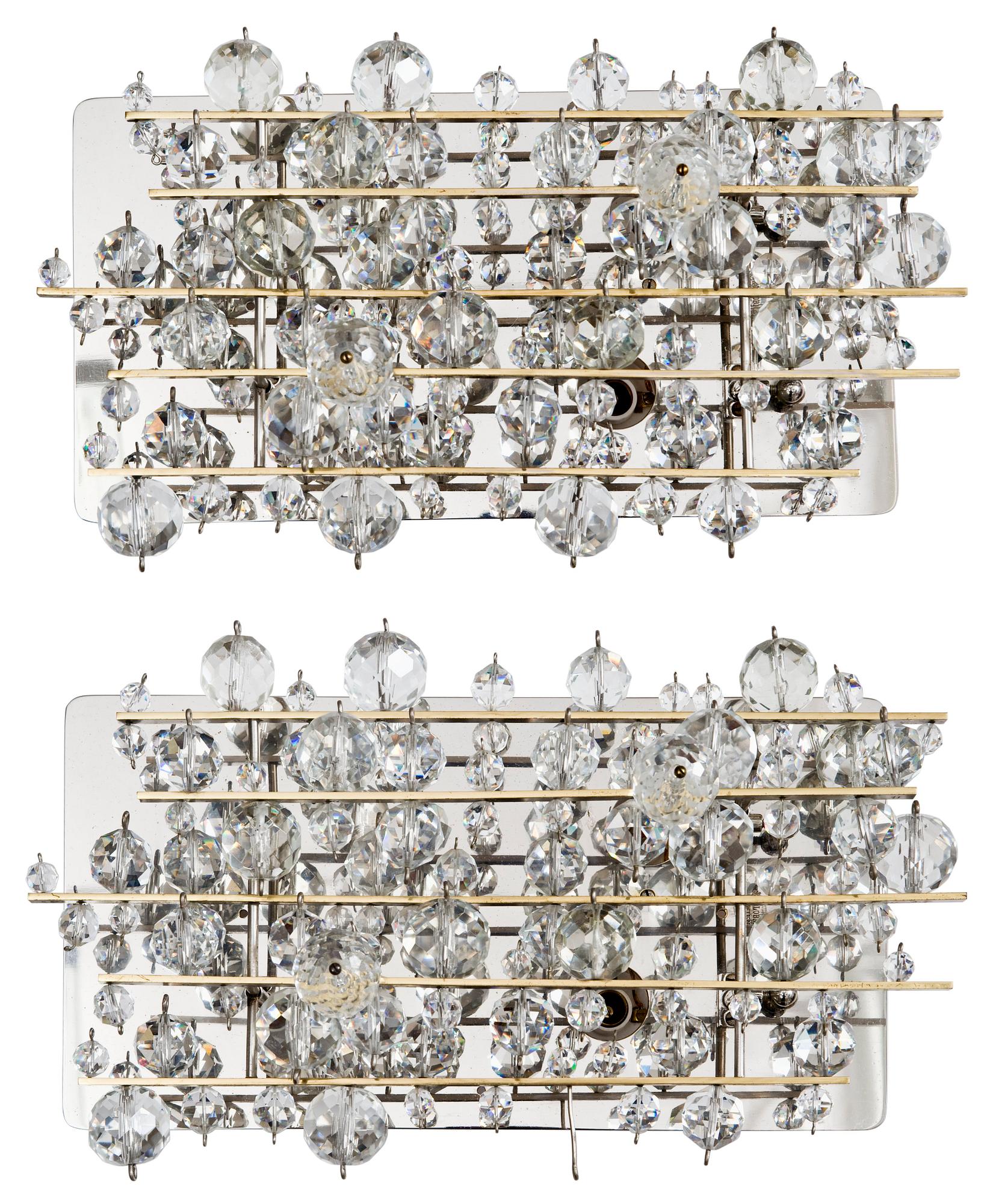 A pair of J. & L. Lobmeyer wall lamps "The Met"/"Exploding Star", Vienna, Austria 1960's.