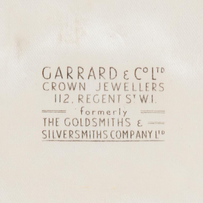 A diamond and sapphire set, probably Garrard & co. The set can be worn as a necklace, earrings, double clip or brooch.