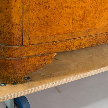 A bureau veneered in Karelian birch, mid-19th century.