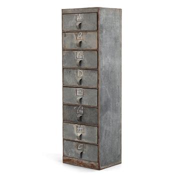 A contemporary metal chest of drawers.