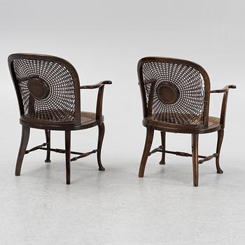 A pair of rattan chairs, first half of the 20th Century.