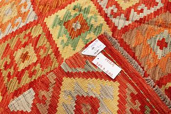 A Kilim carpet, c. 307 x 202 cm.