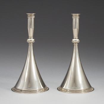 A pair of Wiwen NIlsson sterling candlesticks, Lund 1939.