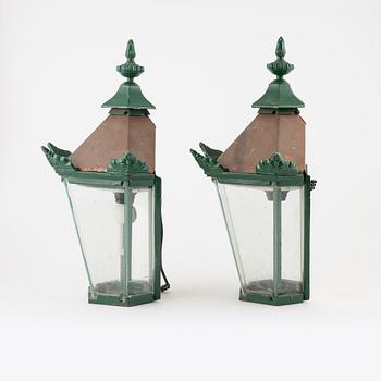 Wall lamps, outdoor lighting, a pair, cast iron, second half of the 20th century.