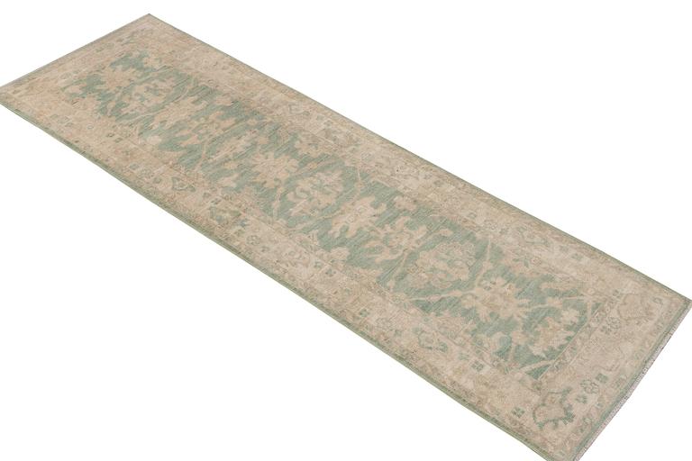 An Ushak runner carpet, c. 293 x 83 cm.