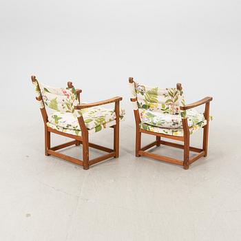 Carl Malmsten, a pair of pine armchairs "Hängsits" 1940-s.