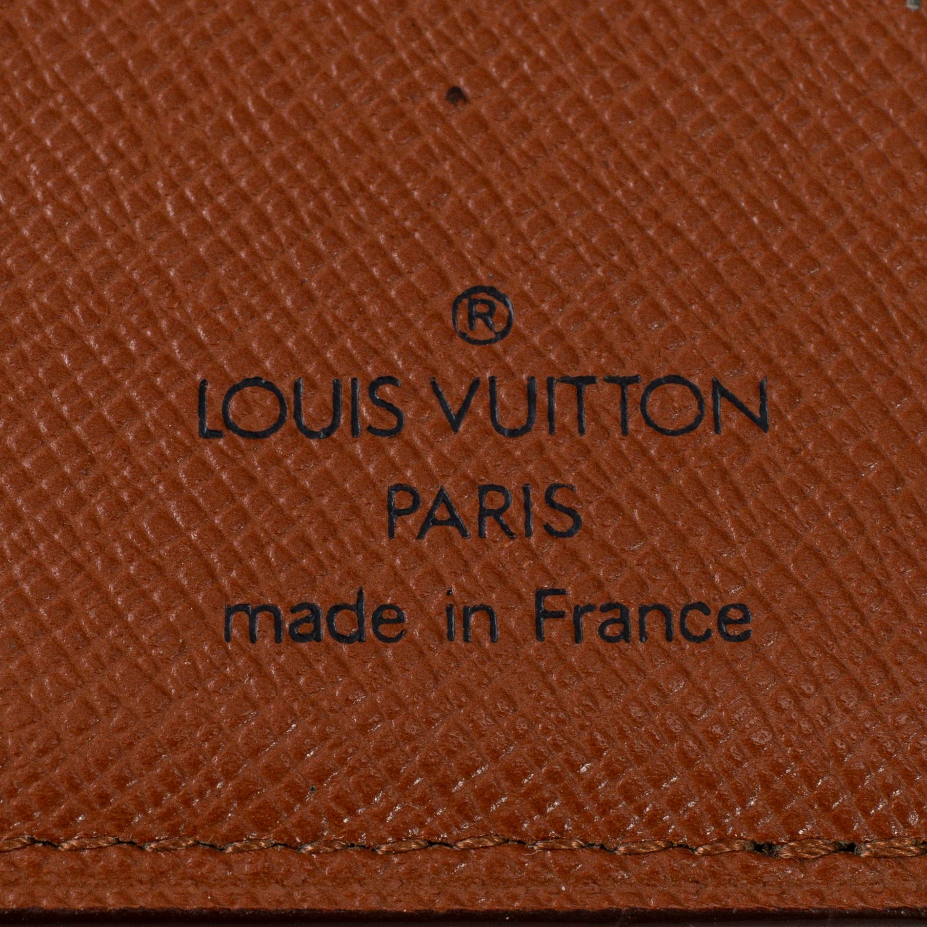LOUIS VUITTON, a wallet and a key holder.
