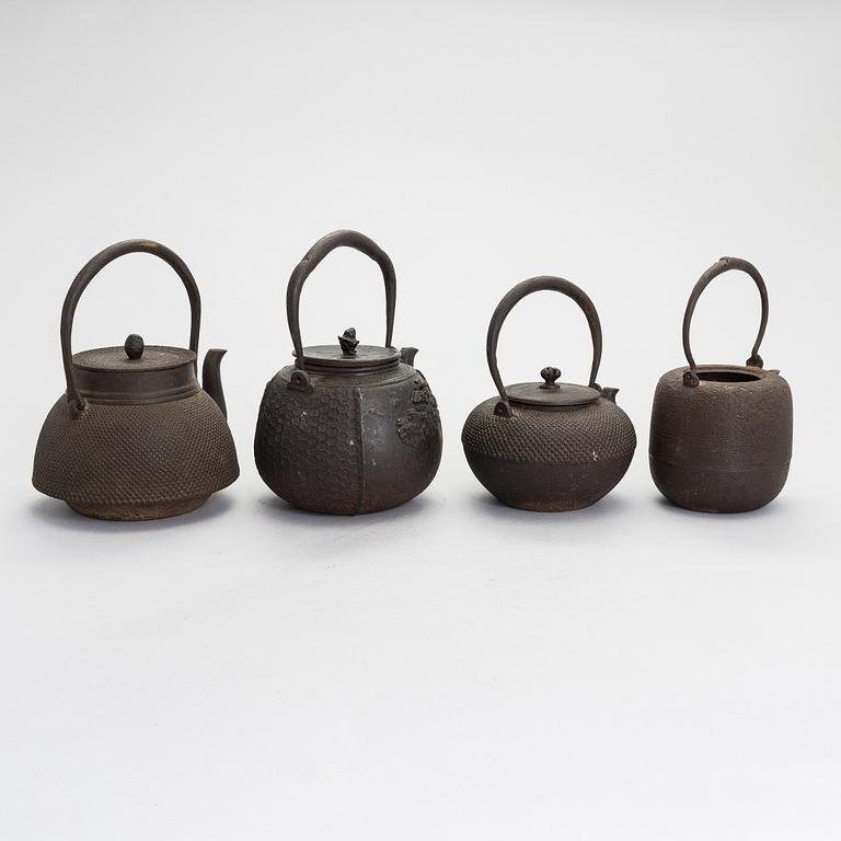 Four Japanese teapots.