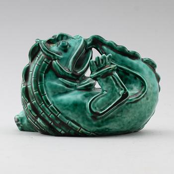 A Wilhelm Kåge stoneware sculpture of a dragon puppy, Gustavsberg ca 1940.