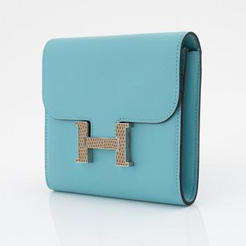 Hermès, a blue leather 'Constance' wallet.