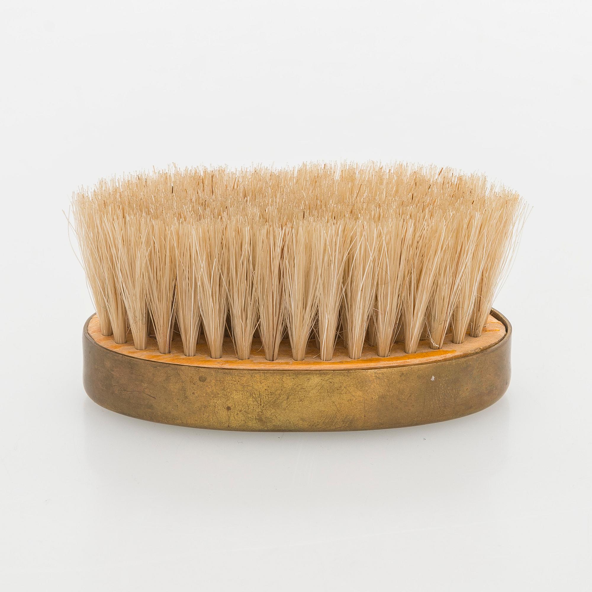 Maija Heikinheimo, A 1960s hand clothes brush for Valaistustyö for Artek, Finland.
