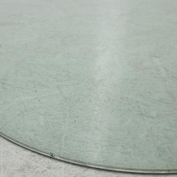 A dining table, glass, contemporary.