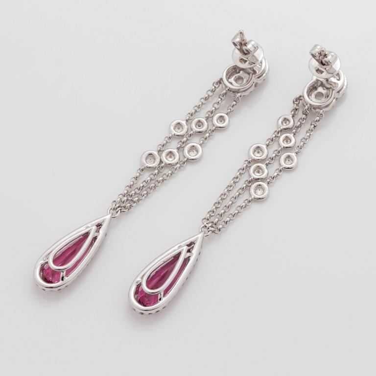 A pair of rubellite and brilliant- and rose- cut diamond earrings.