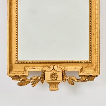 A Gustavian giltwoos mirror by J. Åkerblad (master in Stockholm 1758-99).