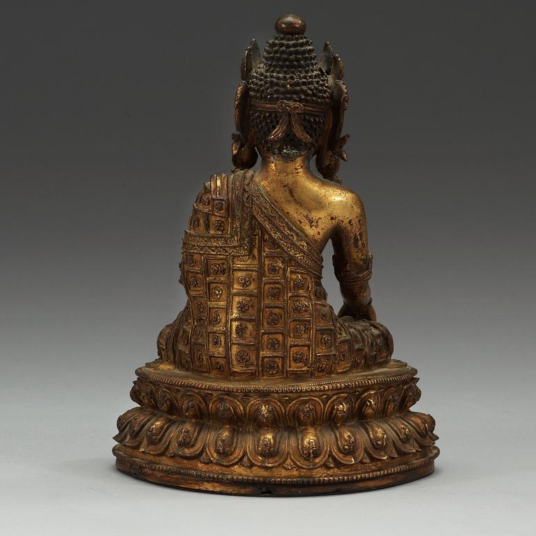 A Tibetan gilt bronze figure of Bodhisattva, presumably 17/18th Century.