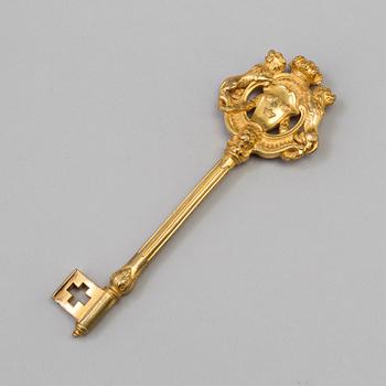 KAMMARHERRENYCKEL, svensk, förgylld brons.