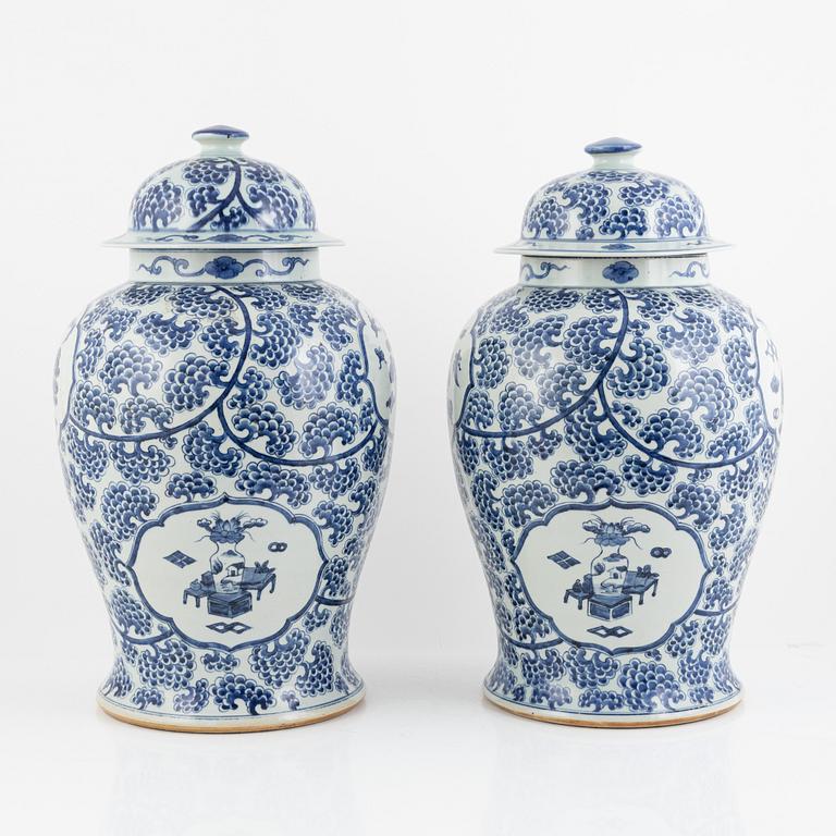 A pair of blue and white porcelain floor urns, China, 20th century.