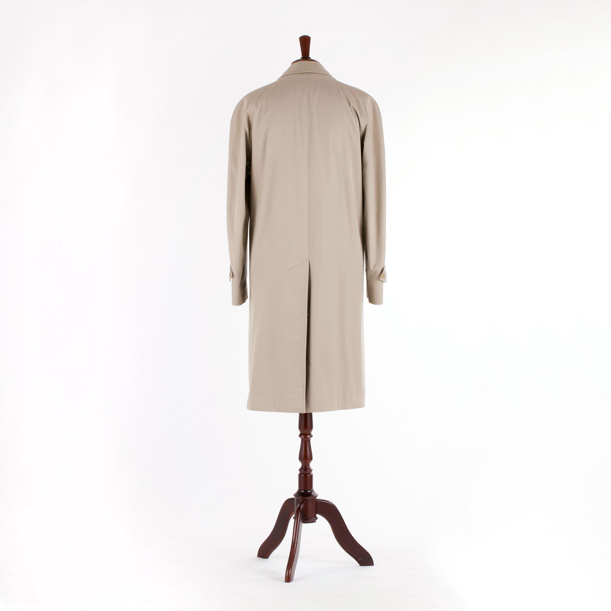 BURBERRY, a men's beige cottonblend trenchcoat.