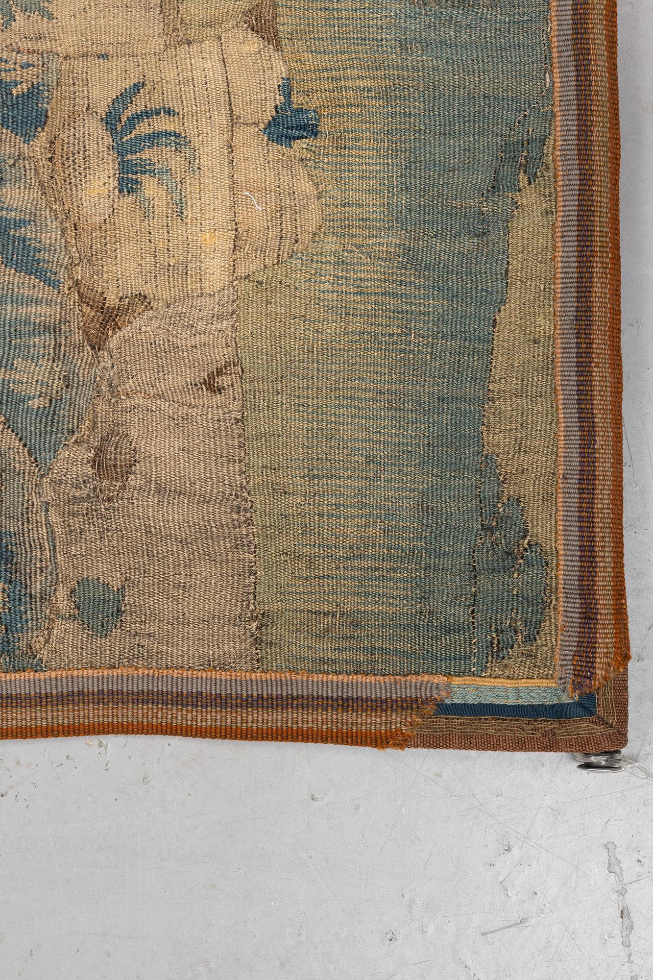 A tapestry fragment, tapestry weave, ca 183  x 113 cm, Flanders end of the 17th century.