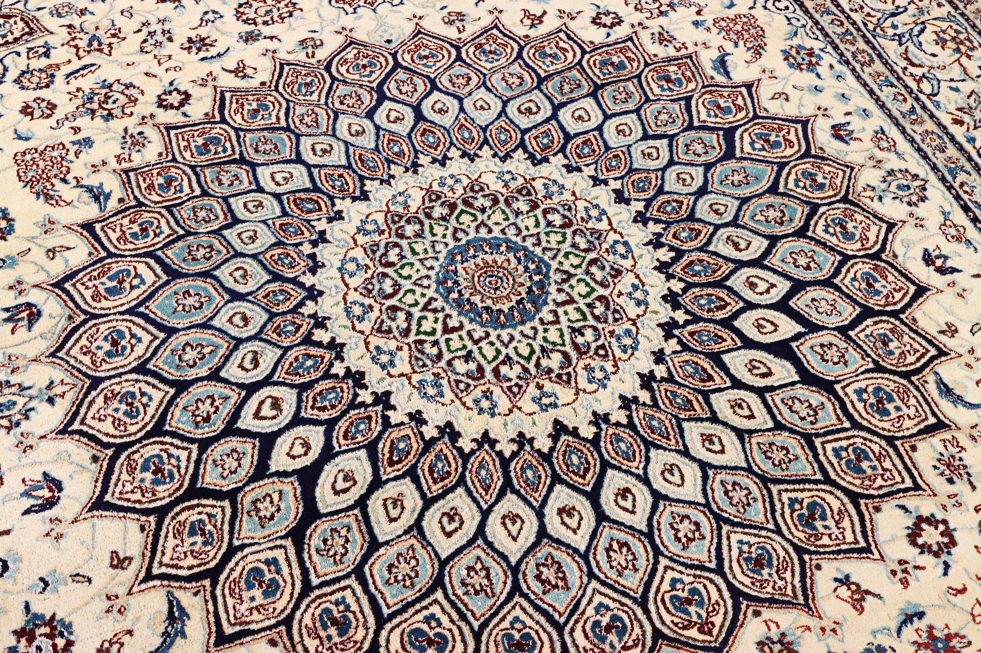 A part silk Nain carpet, 9LA, a. 344 x 245 cm.