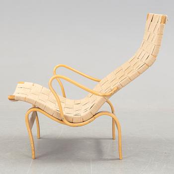 A BRUNO MATHSSON "PERNILLA 2, T. 107" BEECH AND WEBBING ARMCHAIR, Firma Karl Mathsson, Värnamo, Sweden, 1981.