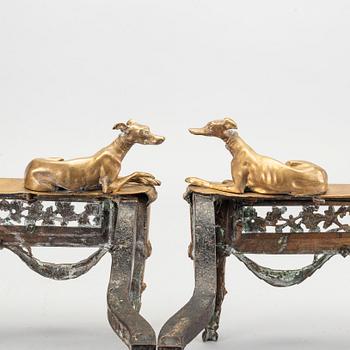 A pair of Louis XVI 18/19 century fire dogs.