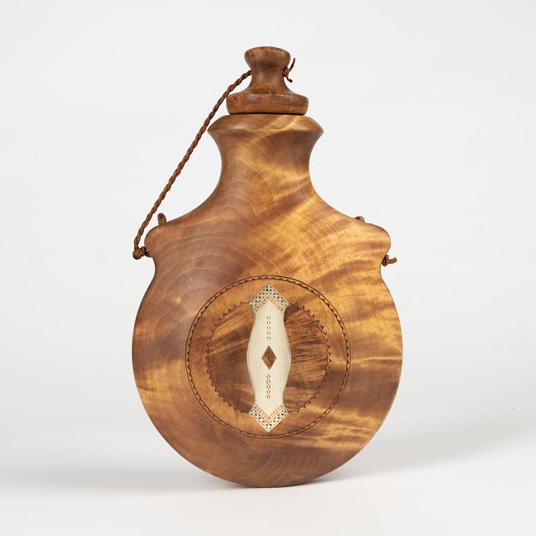 A birch flask by Erik Svonni, signed and dated 1975.