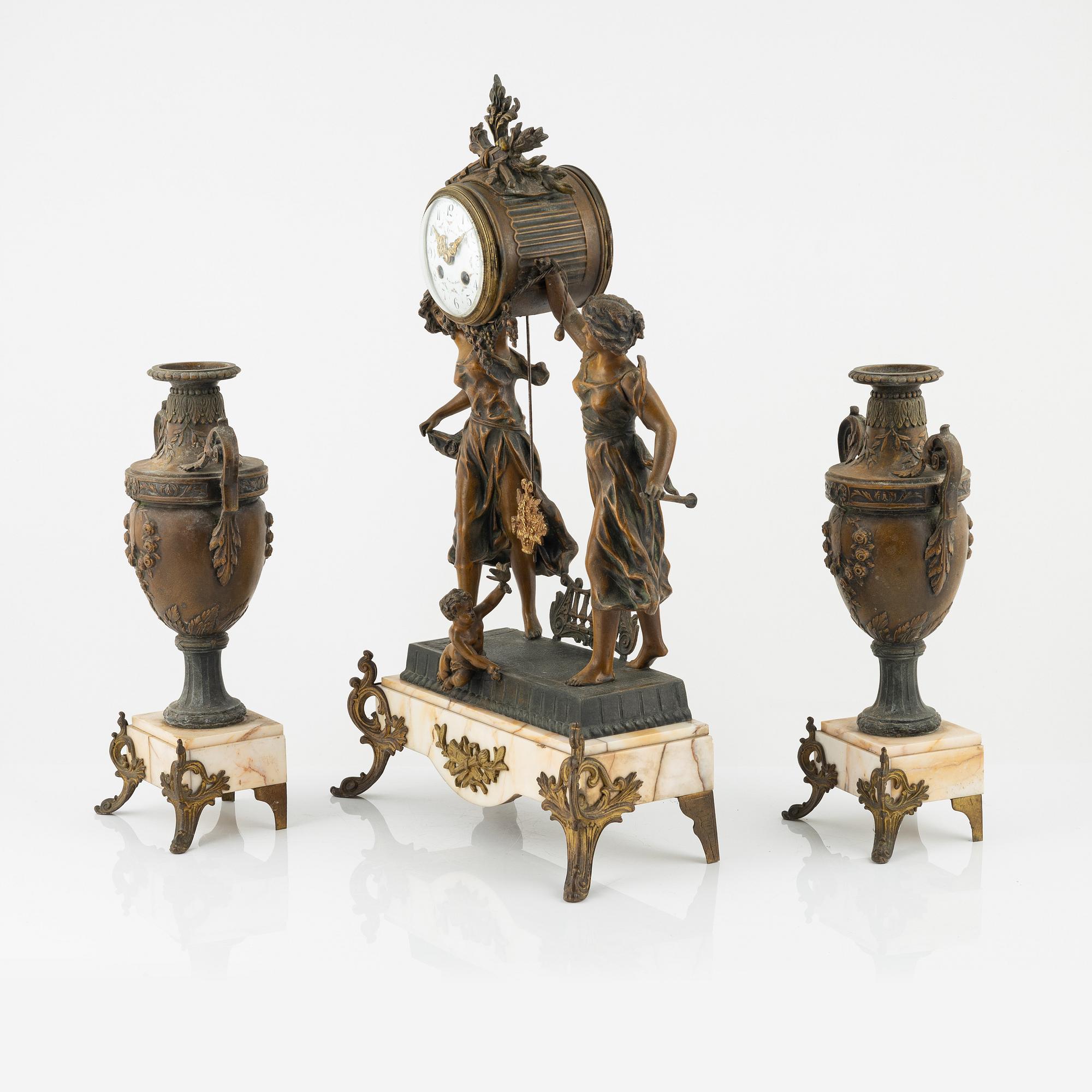 A three-piece mantle set, L. Ferciot, Aix-en-Othe, France, late 19th Century.