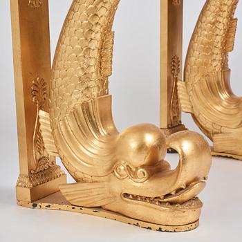 A pair of Swedish Empire carved and giltwood console tables, first half of the 19th century.