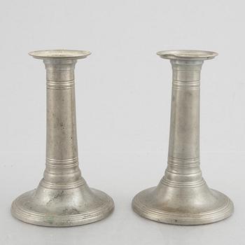 A pair of pewter candle sticks, model A702, Firma Svenskt Tenn, Sweden, 1928.