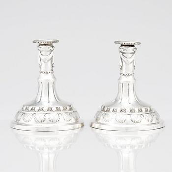 A pair of Swedish silver candlesticks, marks of Sigismund Novisadi the younger, Karlskrona 1780.